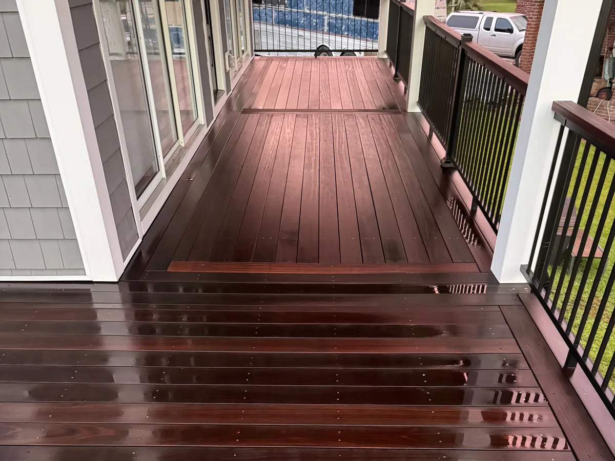 Freshly washed hardwood deck boards, rich and clean, at a Jacksonville NC home