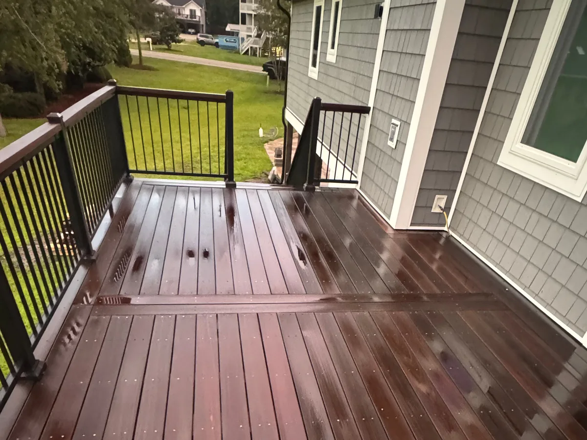 The same hardwood decking sealed to a deep mahogany finish in Jacksonville NC