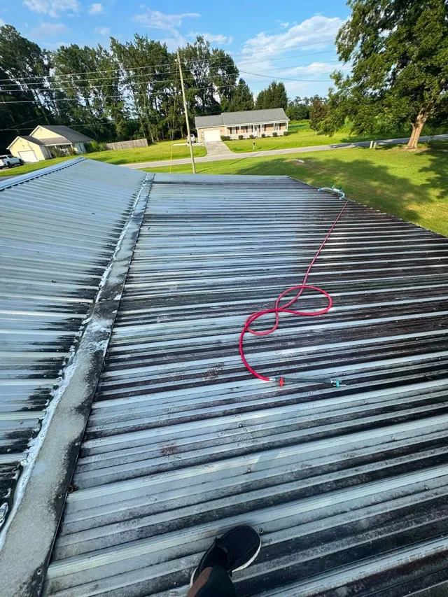 Metal roof — cleaner going down — Ray-Nor-Shine Pro Wash job photo