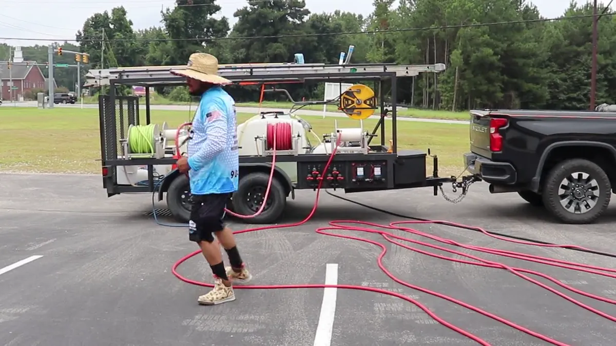 Ray-Nor-Shine Pro Wash truck and equipment trailer set up on a job site in Jacksonville NC